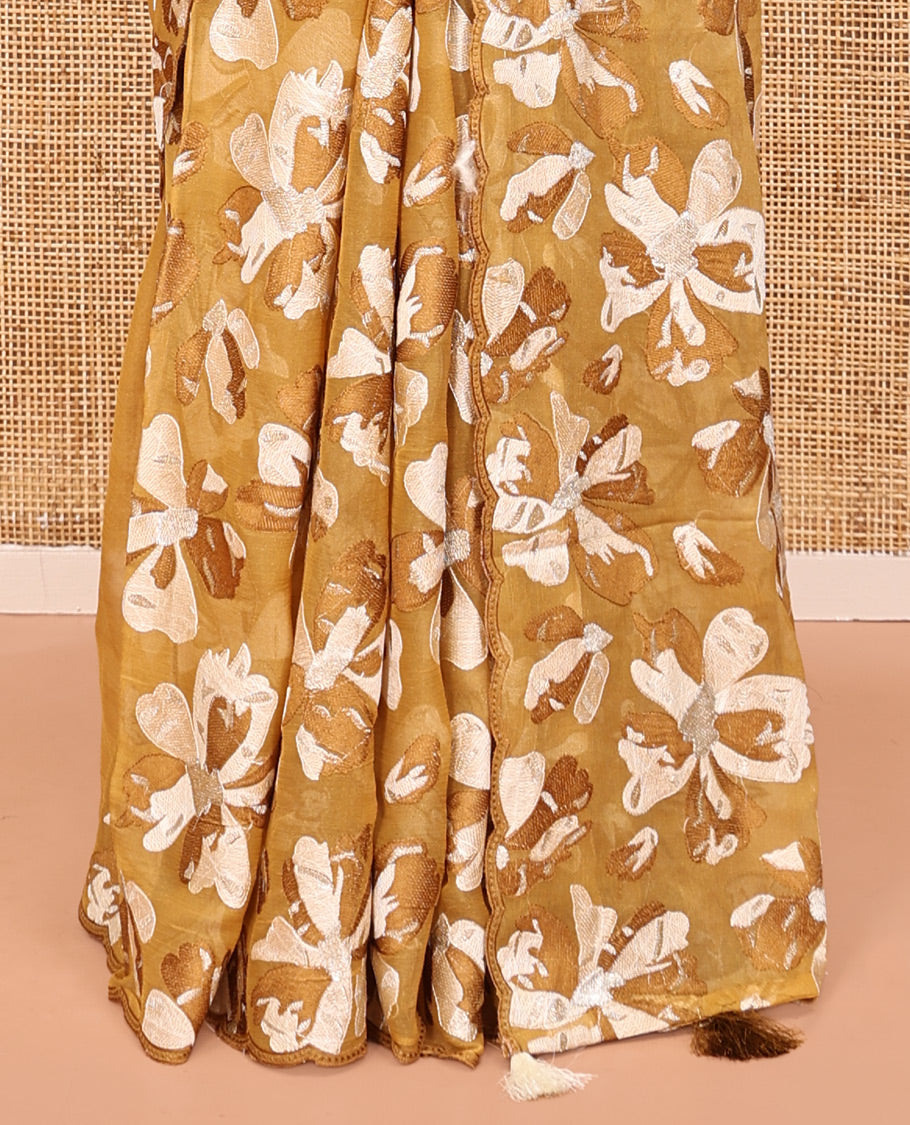 Brown Organza Saree, Steeped in the Prettiness of Floral Thread Embroidery, a Scalloped Border, and a Matching Blouse