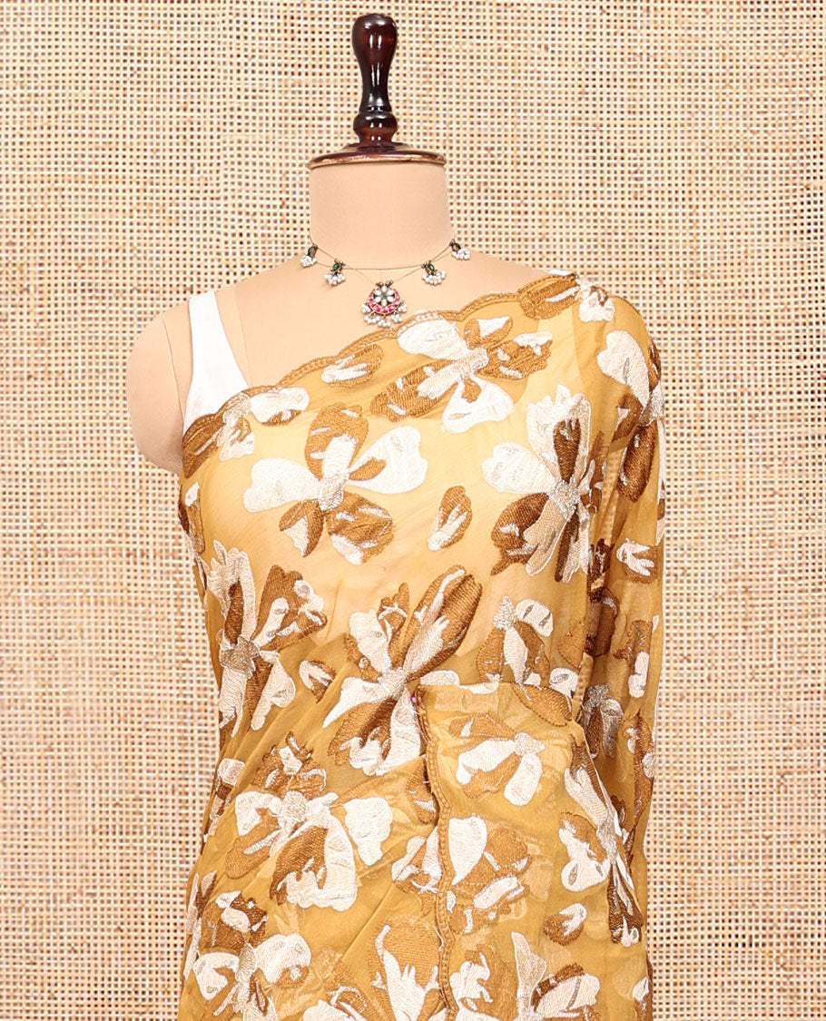 Brown Organza Saree, Steeped in the Prettiness of Floral Thread Embroidery, a Scalloped Border, and a Matching Blouse