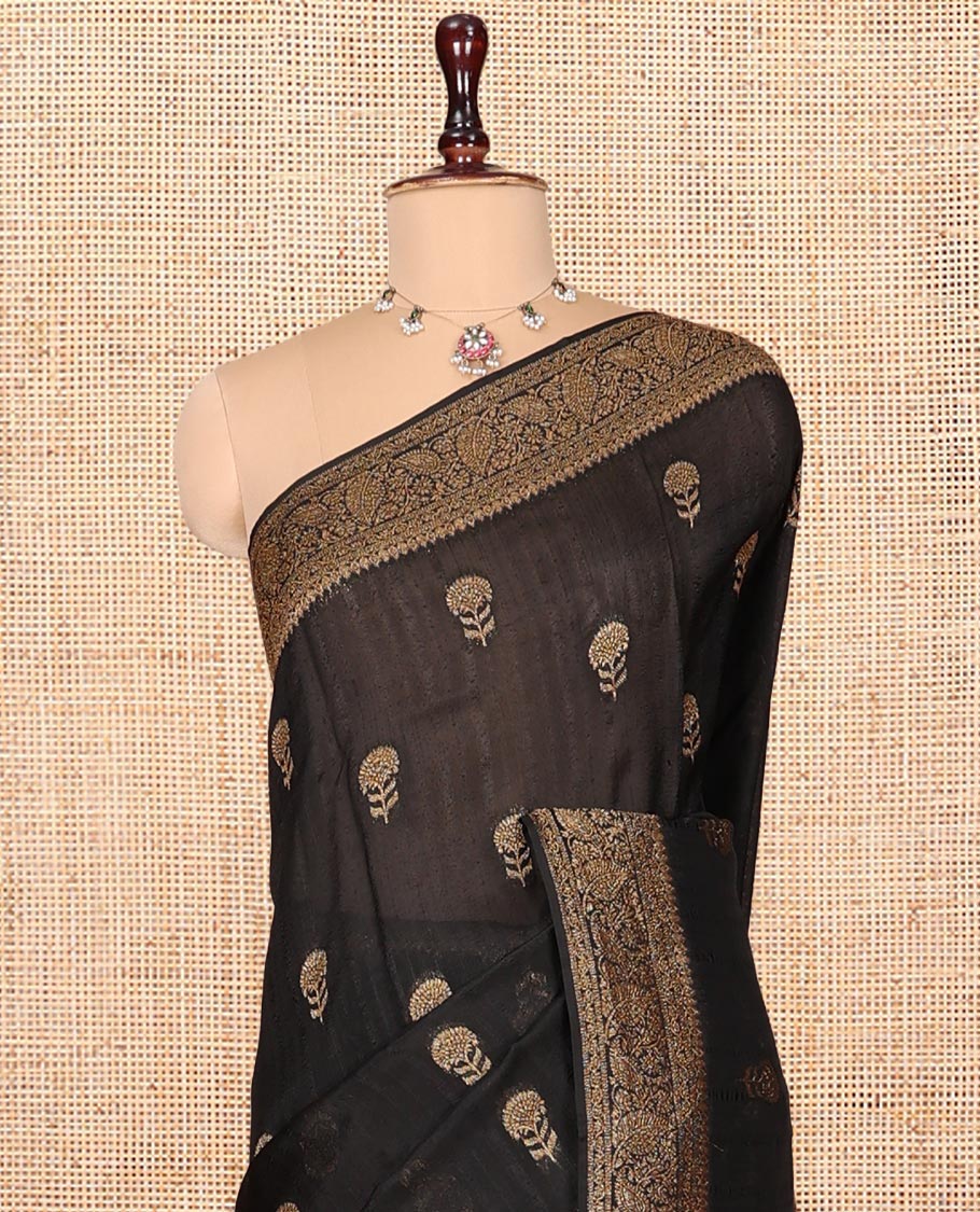 Black Matka Silk Saree, Mesmerized with Floral Buttas on Its Body, Highlighted by a Floral and Paisley Design Border, Pallu of Floral Designs, and Paired with a Matching Blouse