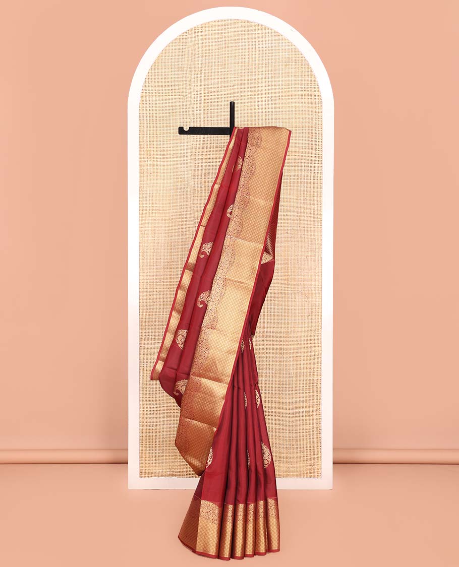 Red Vasundhara Lite Silk Mix Saree, Detailed with Zari Buttas All Over Its Body, Highlighted by a Zari Border of Floral and Jaal Designs, Pallu Steeped with Chevron Stripes, and Paired with a Matching Blouse