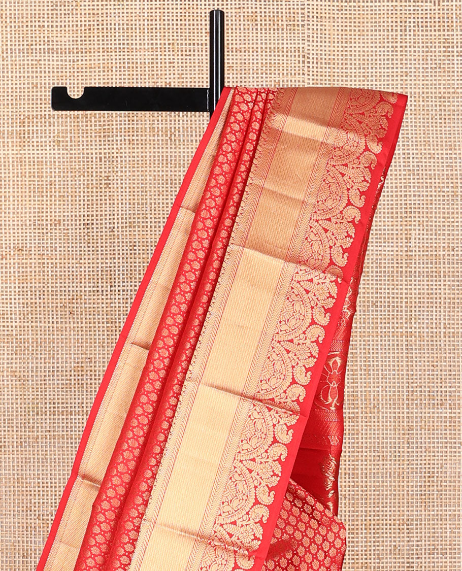 Red jacquard kancheepuram silk saree with self border of intricate zari design & floral design pallu