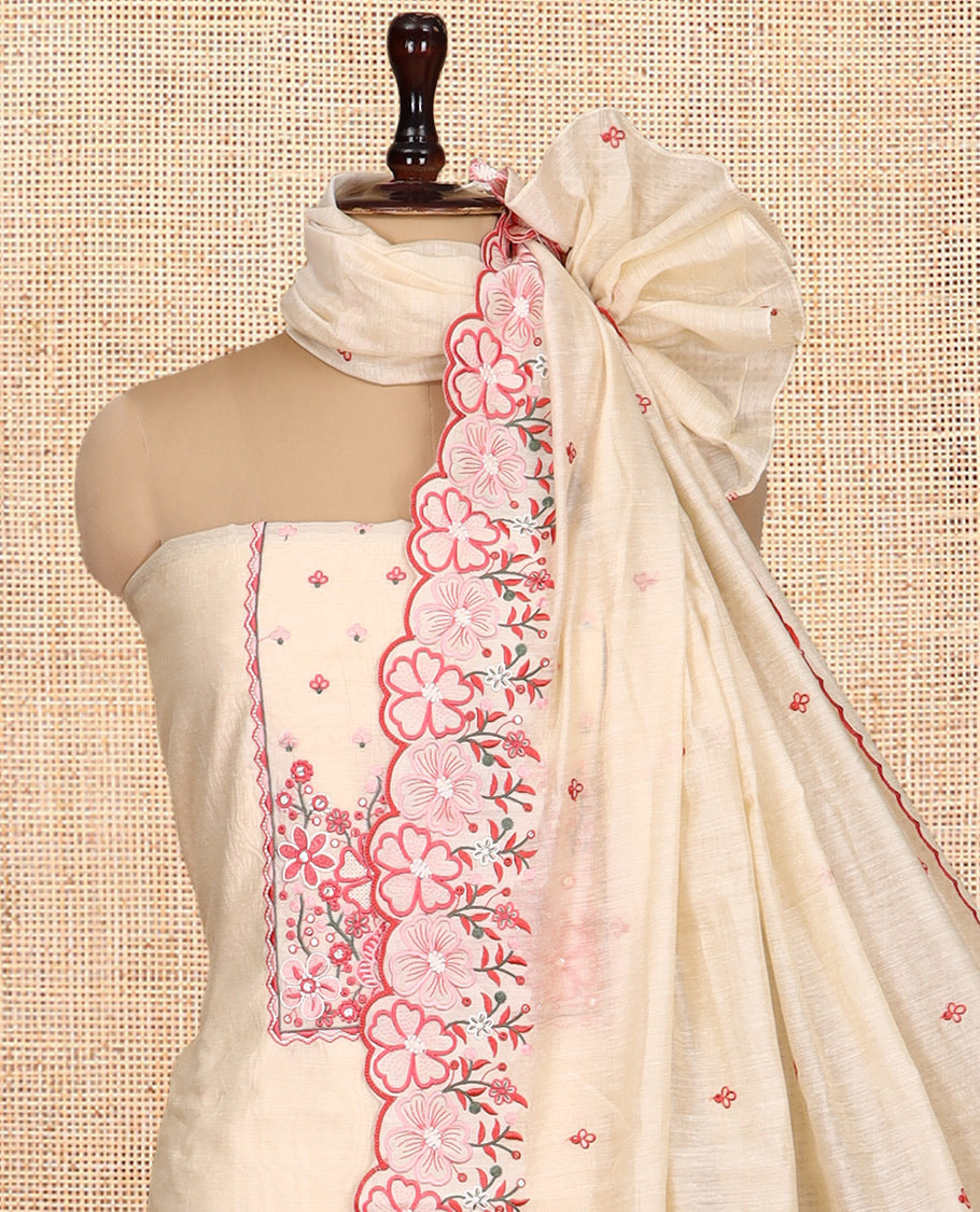 Cream Mul Chanderi Material Churidar Features Floral Embroidered Top, a Plain Bottom, a Floral Embroidered Scallop Dupatta