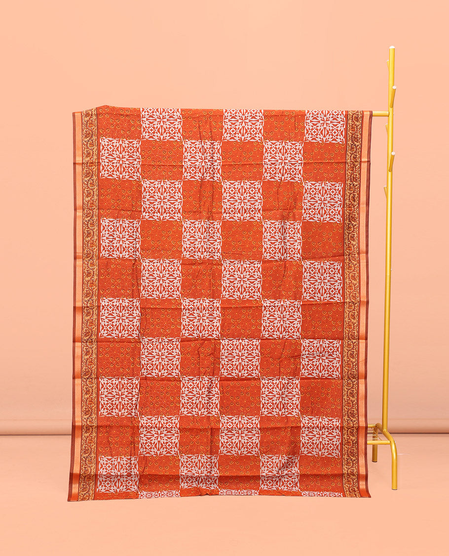 Orange Kanchi Cotton Saree, Adorned with Geometric Patterns Printed All Over Its Body, a Subtle Border, Pallu of Floral and Chakra Print, and Paired with a Matching Blouse