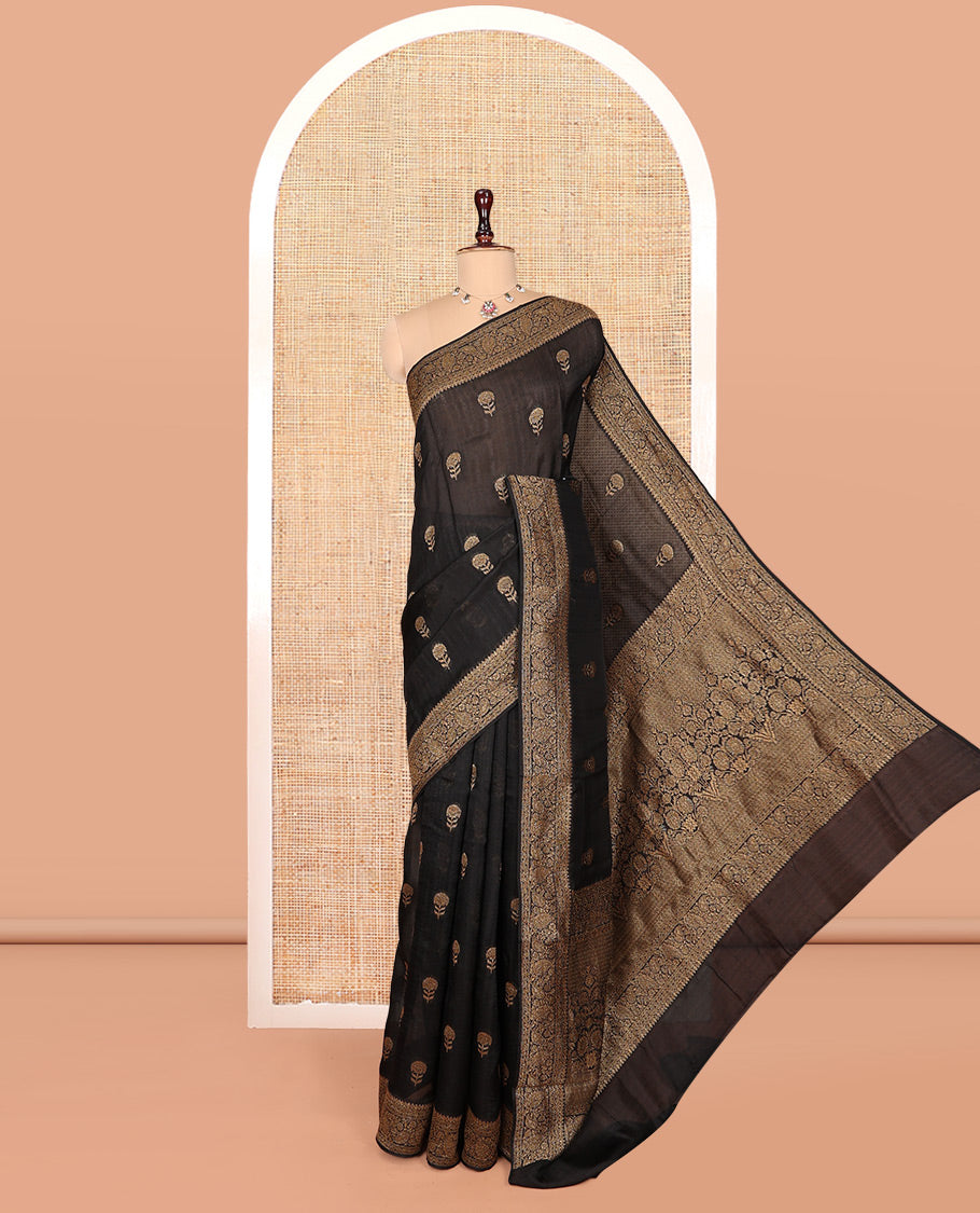 Black Matka Silk Saree, Mesmerized with Floral Buttas on Its Body, Highlighted by a Floral and Paisley Design Border, Pallu of Floral Designs, and Paired with a Matching Blouse