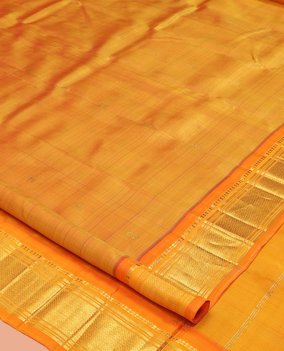 Orange Kanchipuram Silk Saree, Woven with Zari Buttas, a Contrast One-Sided Border of Panner Sombu, Banaras, Muthu, and Jaal Designs, a Zari Design Pallu, and No Blouse