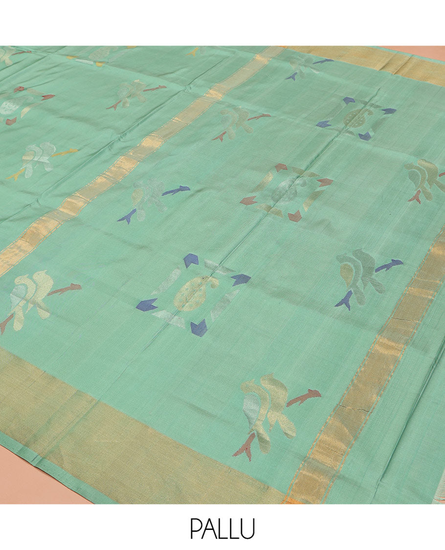 Green Uppada Silk Saree, Bedecked with Meena Zari Buttas on Its Body, Subtle Bavanji Border, Pallu of Meenakari Zari Buttas, and Paired with a Matching Blouse