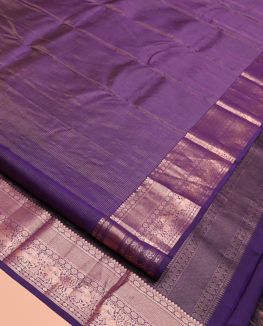 Violet Kanchipuram Silk Saree, Gleamed Up with Micro-Checks, Zari Border of Thilakam Mokku, Chakram, and Kuthirai Designs, Pallu of Jaal Design, and Matching Blouse