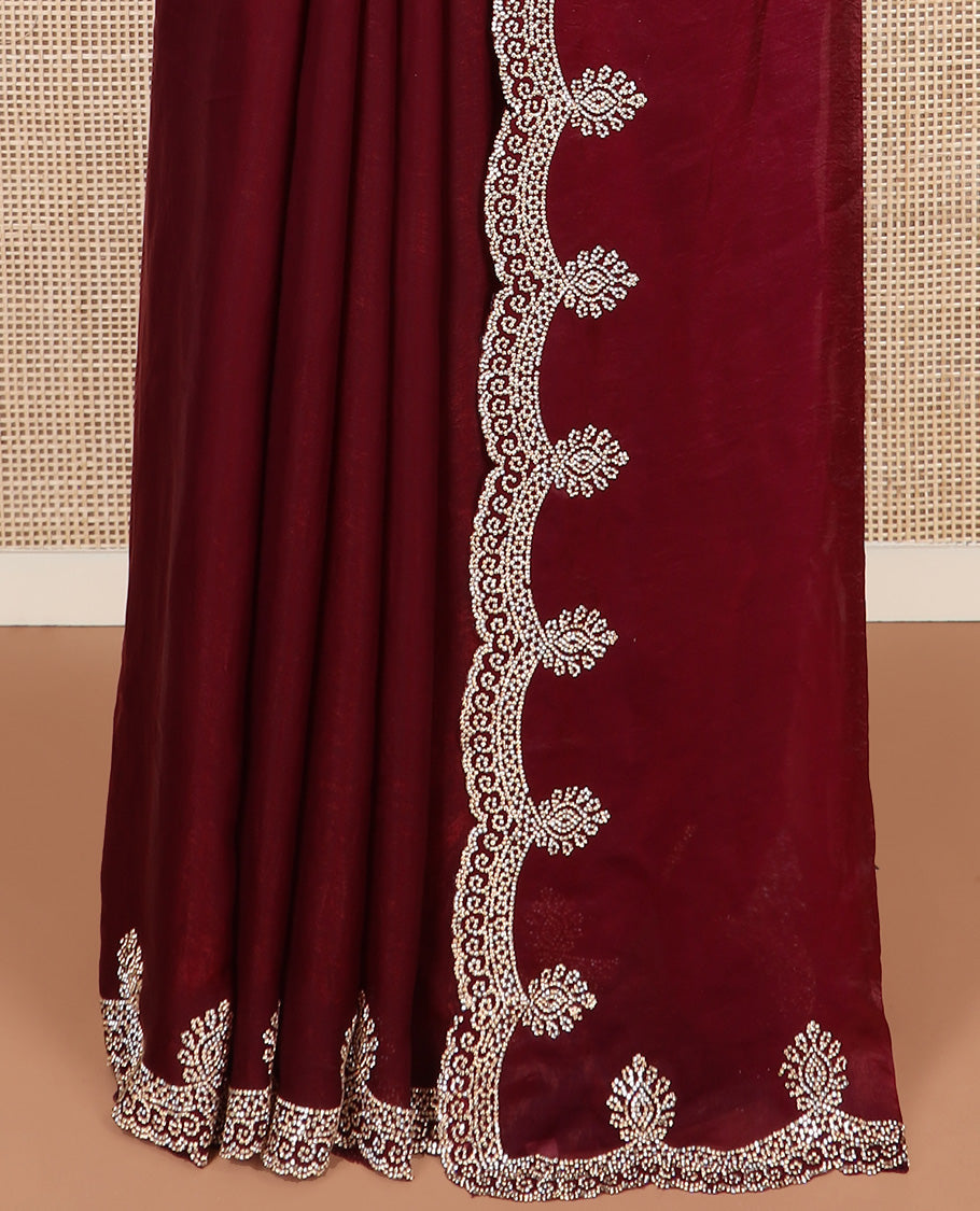 Maroon plain designer saree, intricately stone work border