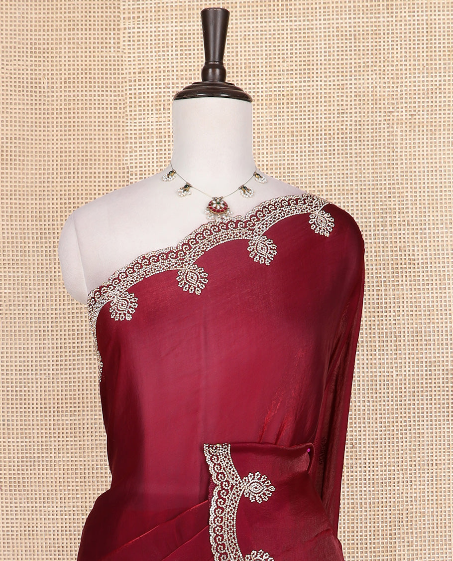 Maroon plain designer saree, intricately stone work border