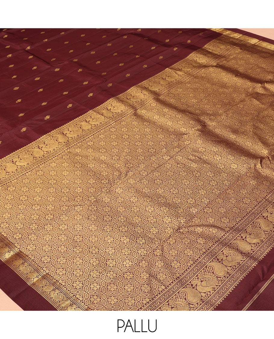 Maroon Vasundhara Silk Saree, Woven with Zari Buttas, a Zari Kaal Eragina Border of Rekku, Neli, Manga, and Mayil Designs, Grand Pallu, and a Matching Blouse