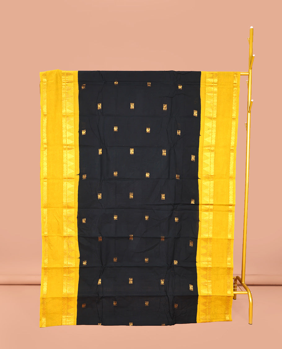 Black Sungudi Cotton Saree, Prettified with Zari Buttas on Its Body, Complemented by a Contrast Retttai Pettu Traditional Zari Design Border, Zari-Design Pallu, and Paired with a Contrast Blouse