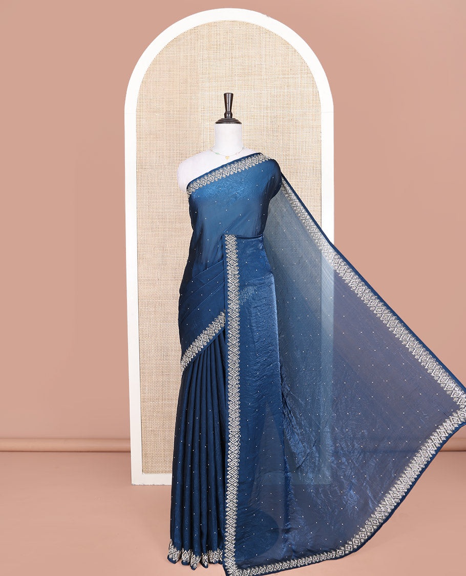 Blue Designer Saree, Accentuated with Stone Struck on Its Body, Highlighted by a Stone Embroidered Border, Self-Pallu, and Paired with a Matching Blouse