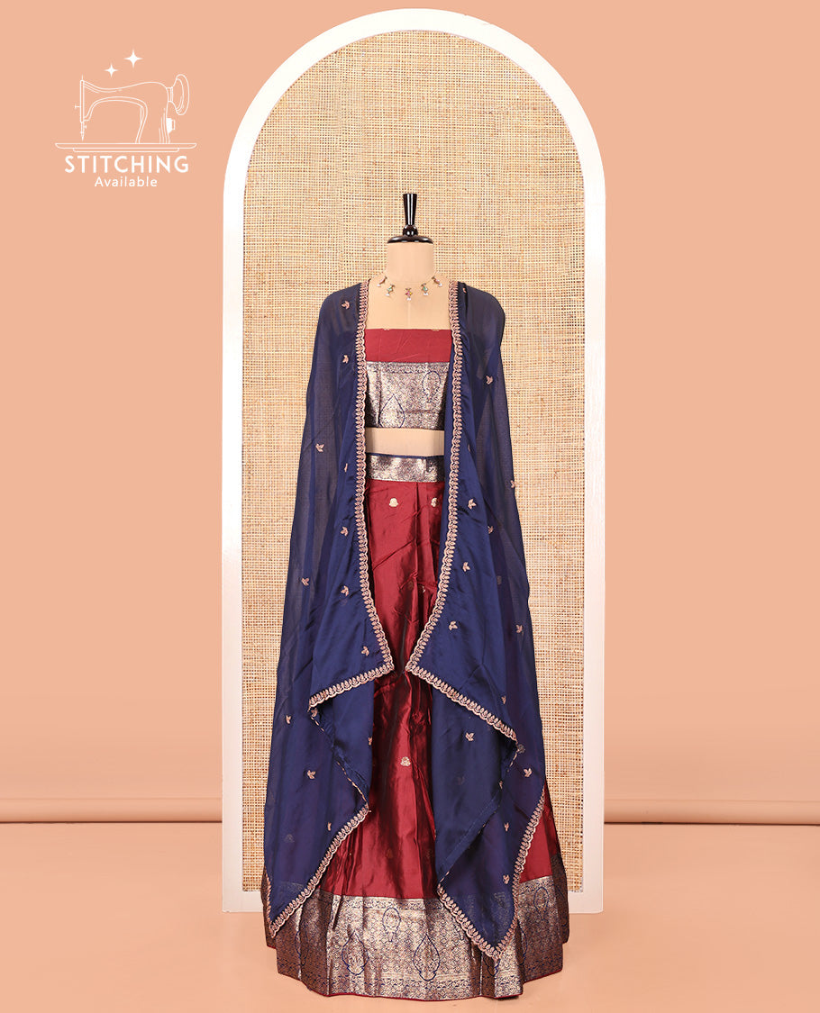 Maroon and Navy Blue Semi-Banarasi Half-Saree, Adorned with Zari Buttas on Its Skirt, Complemented by a Contrast Intricately Zari-Designed Border, Paired with a Matching Blouse, and a Contrast Satin Georgette Embroidered Scallop Dhavani