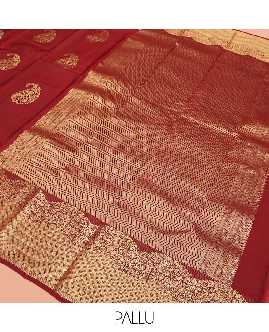 Red Vasundhara Lite Silk Mix Saree, Detailed with Zari Buttas All Over Its Body, Highlighted by a Zari Border of Floral and Jaal Designs, Pallu Steeped with Chevron Stripes, and Paired with a Matching Blouse