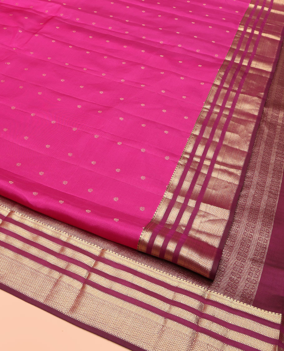 Pink Kanchipuram Silk Saree, Subtly Enriched with Zari Buttas All Over Its Body, Complemented by Contrast Border of Muthu, Banaras, and Mayil Kann Designs, Sparsely Striped Pallu, and Paired with a Contrast Blouse