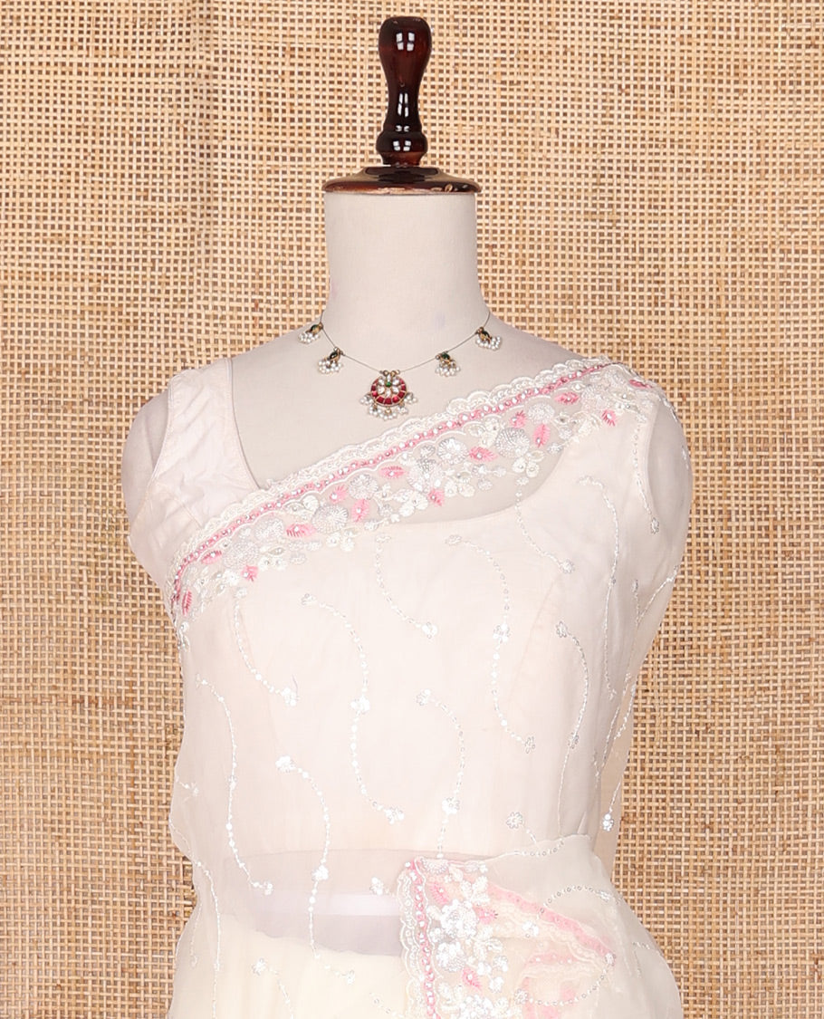 Cream stone & pink thread embroidered designer saree, scallop stone & thread embroidered border