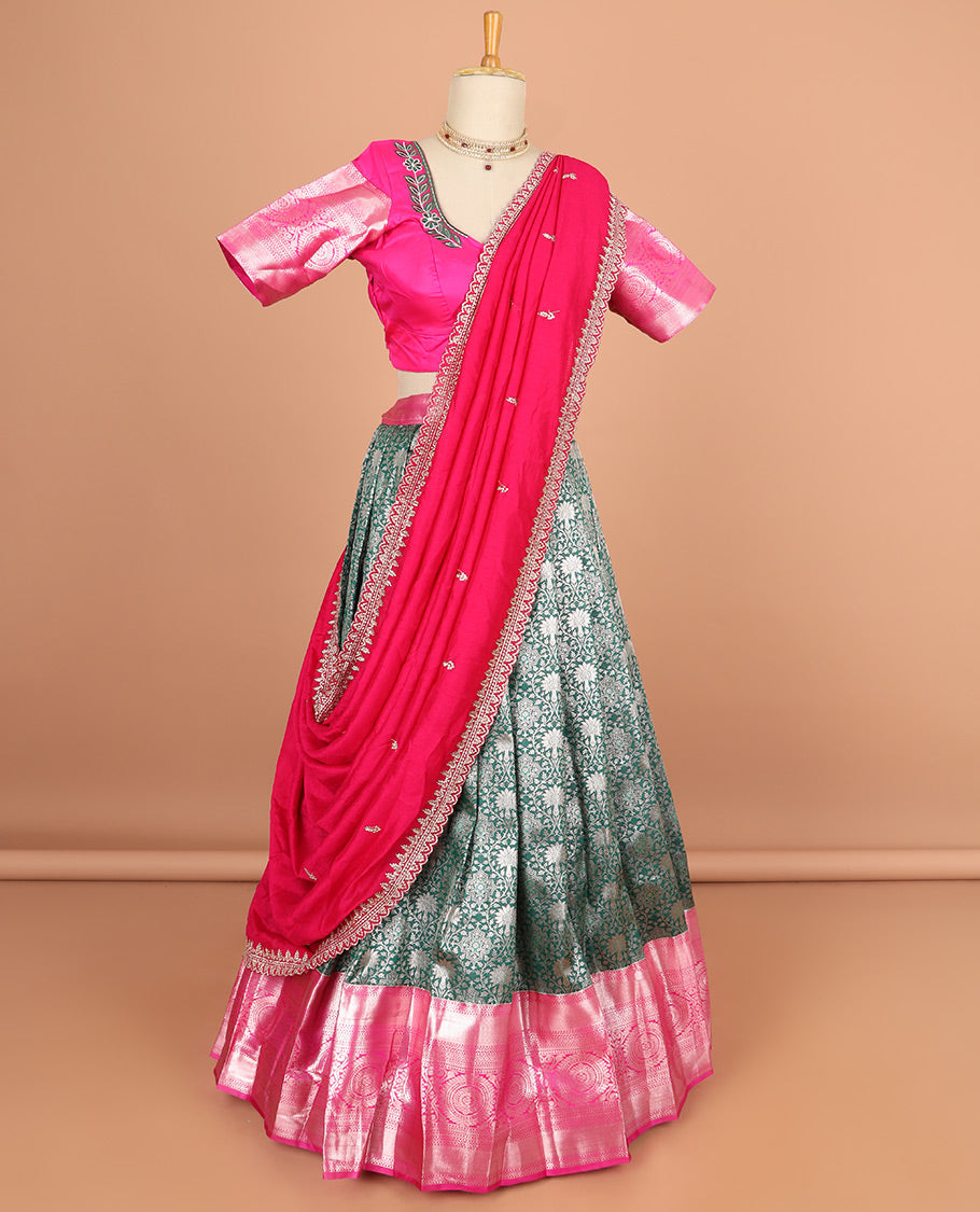 Green floral jacquard half saree with contrast zari design border , floral fembroidery blouse & floral embroidery scallop border dhavani