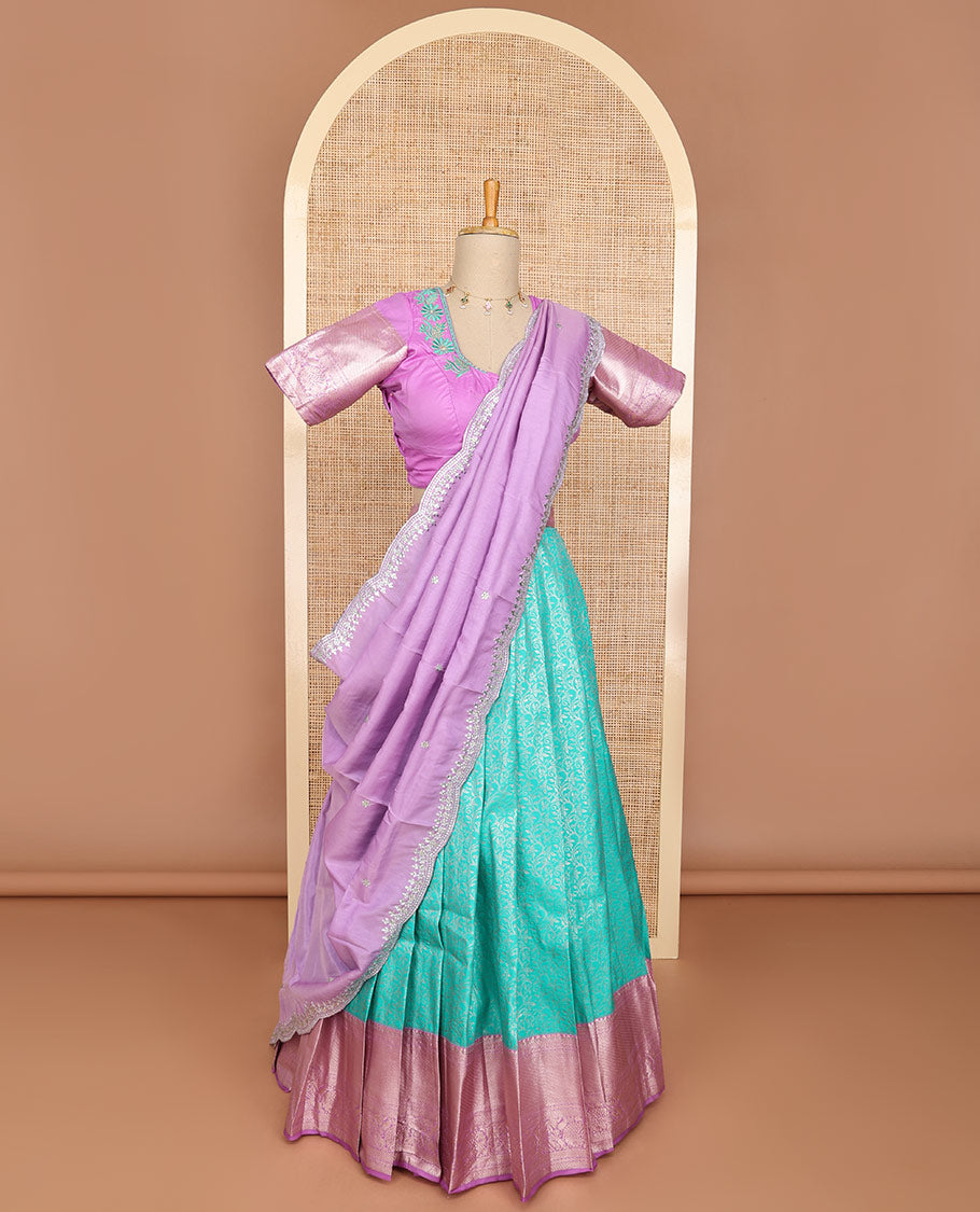 Sea blue floral art silk half saree with contrast zari design border, embroidered blouse & floral embroidery dhavani