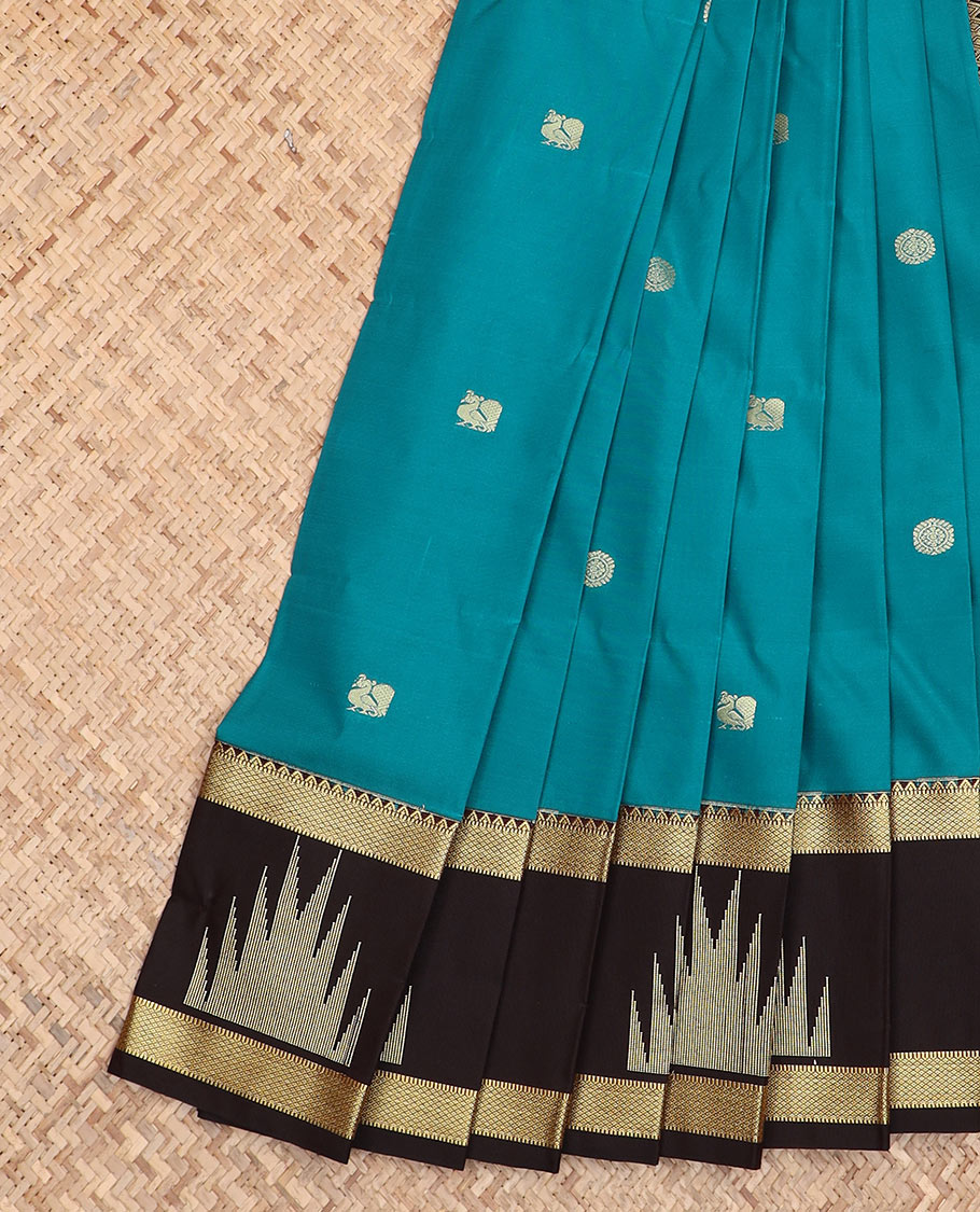 Blue peacock and chakram motifs budget silk saree, contrast traditional zari design border, and geometric design woven pallu