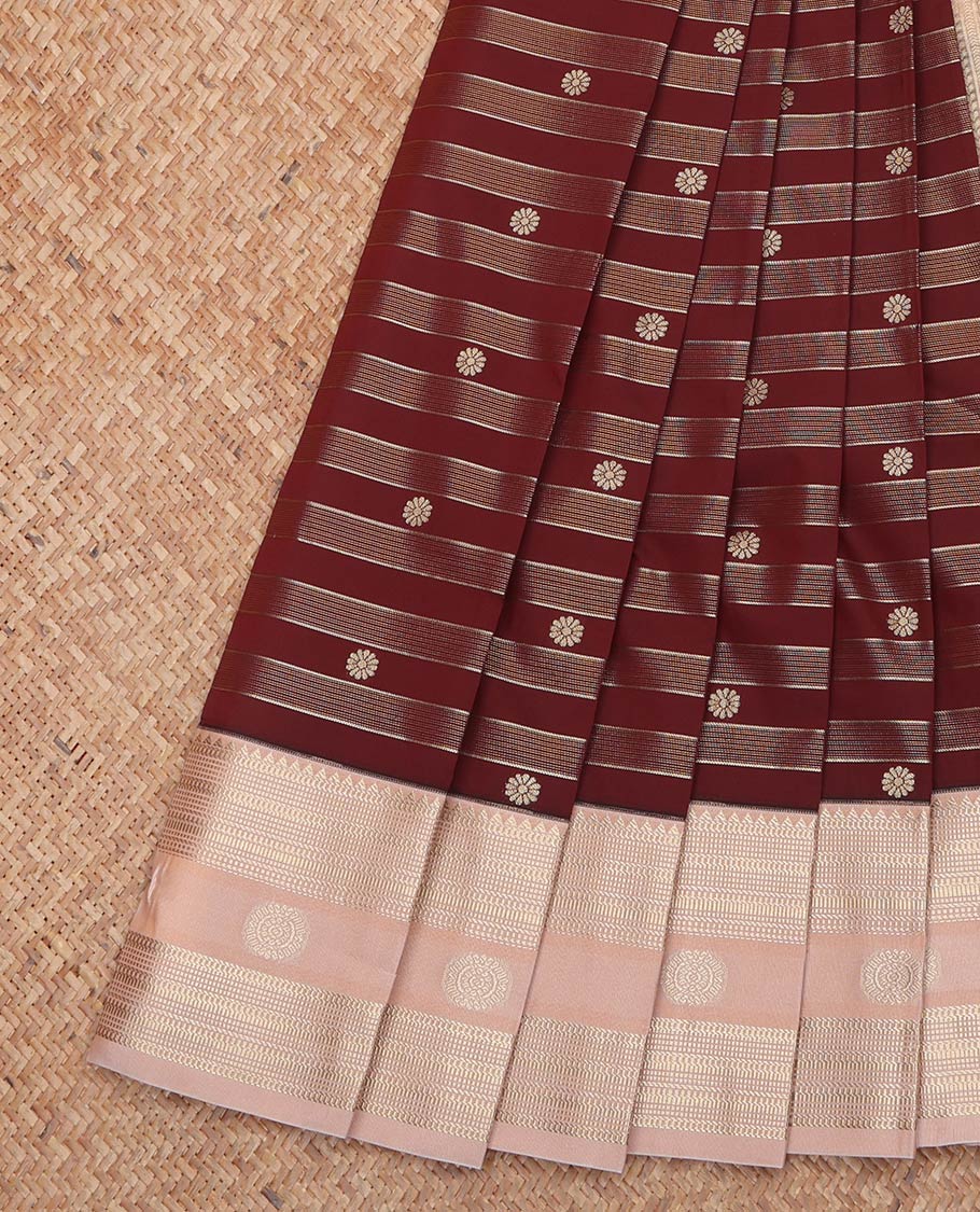 Brown Budget Silk Saree, Artfully Designed with Zari Buttas and Stripes All Over Its Body, Complemented by Contrast Traditional Zari Designs Woven Border, Grand Jaal Pallu and Paired with a Contrast Blouse