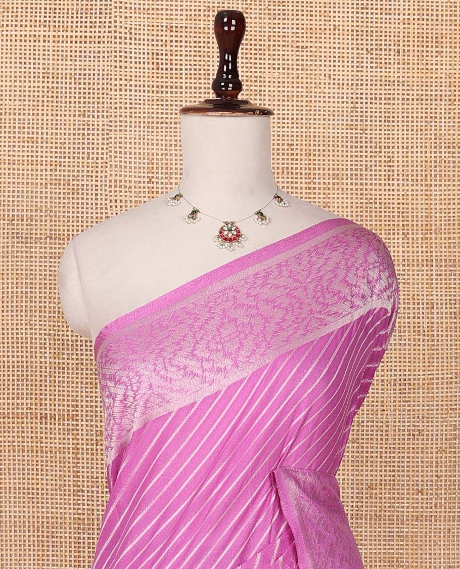 Pink diagonal striped fancy crepe saree, self-border & pallu of zari designs