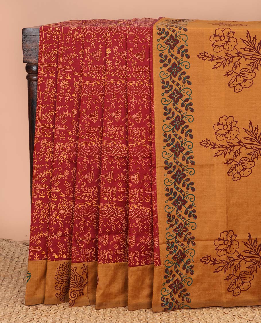 Red warli village theme buttas block printed poly cotton saree, contrast peacock printed border, and floral printed pallu