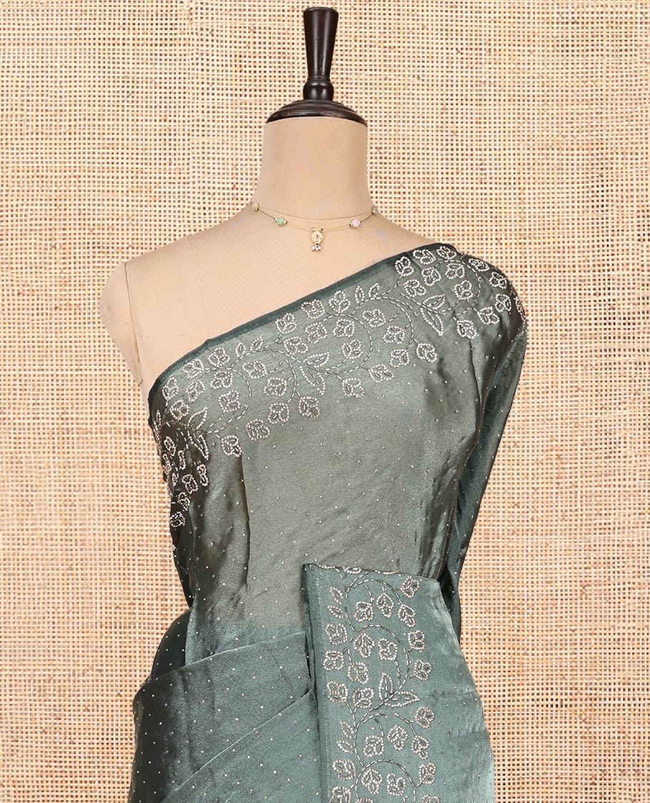 Grey Designer Saree, Enthralled with Stone Work All Over Its Body, a Scallop Floral Embroidered Border, and Matching Blouse