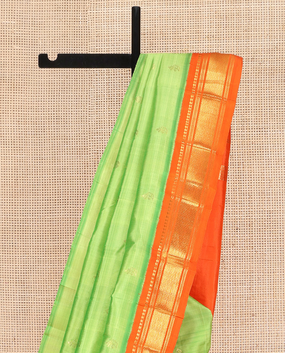 Green Kanchipuram Silk Saree, Finely Crafted with Zari Buttas on Its Body, Complemented by a Contrast One-Sided Korvai Border of Panner Sombu, Banaras, Muthu, and Mayil Kann Designs, Pallu Steeped with Zari Designs, and Comes Without a Blouse