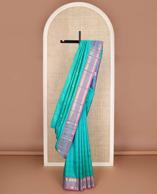 Blue zari buttas kanchipuram silk saree, contrast one-sided border of rekku,muthu & mayil kann & zari design pallu