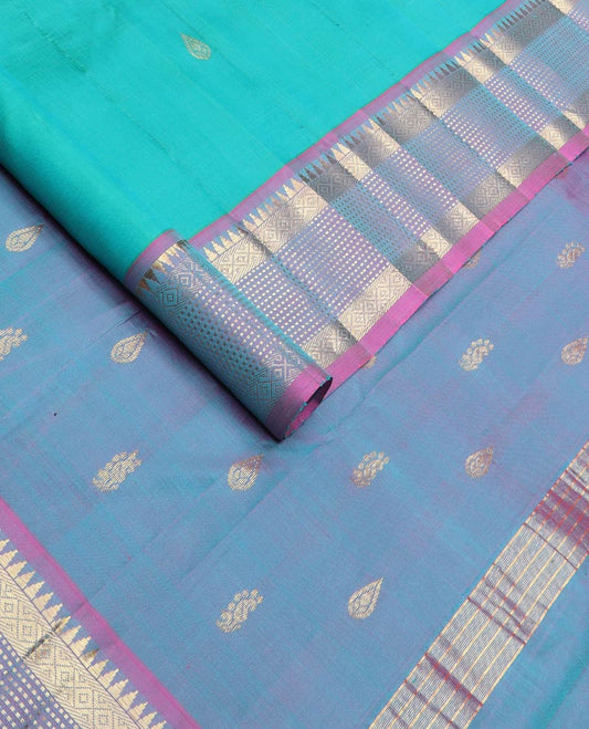 Blue zari buttas kanchipuram silk saree, contrast one-sided border of rekku,muthu & mayil kann & zari design pallu