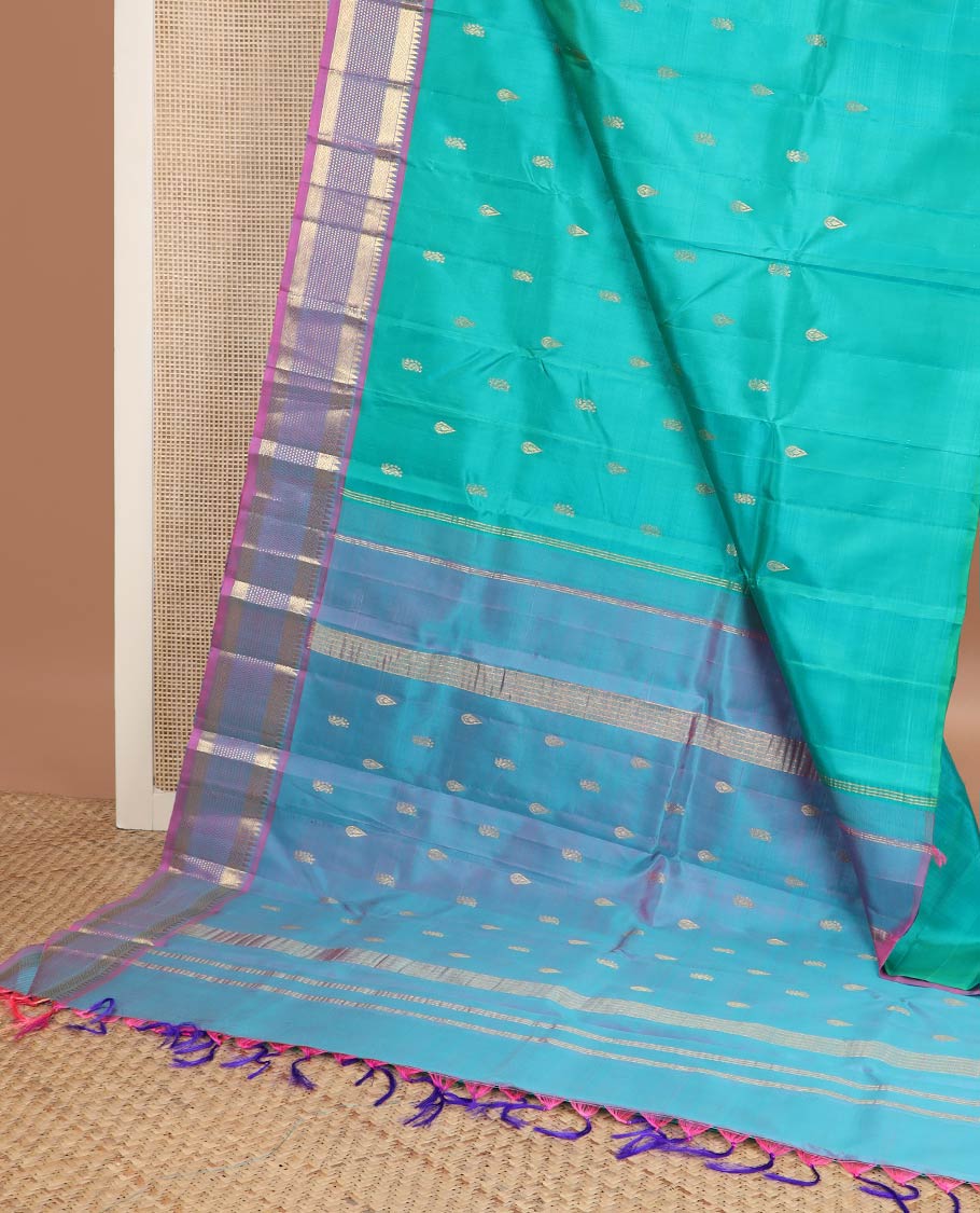 Blue zari buttas kanchipuram silk saree, contrast one-sided border of rekku,muthu & mayil kann & zari design pallu