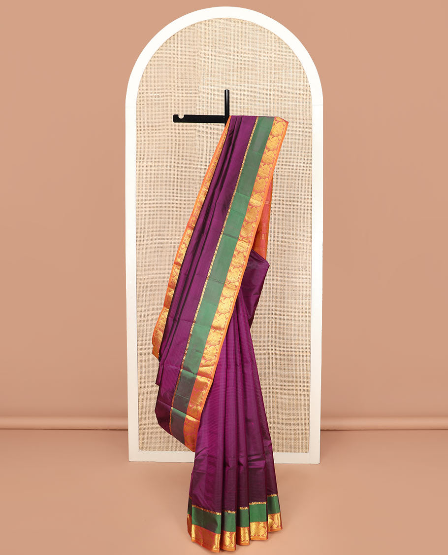 Purple Striped Kanchipuram Silk Saree Spotlighted with a Contrast Rettai Pettu Border Featuring Mayil Designs, a Subtle Striped Pallu, and a Contrast Blouse