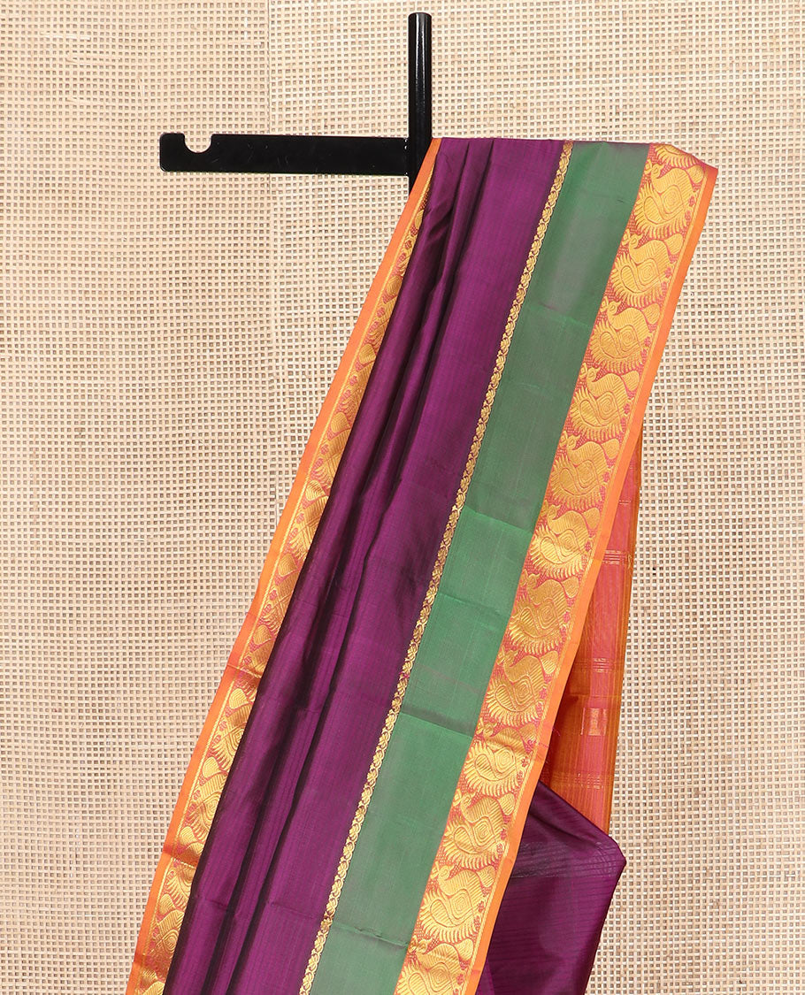 Purple Striped Kanchipuram Silk Saree Spotlighted with a Contrast Rettai Pettu Border Featuring Mayil Designs, a Subtle Striped Pallu, and a Contrast Blouse