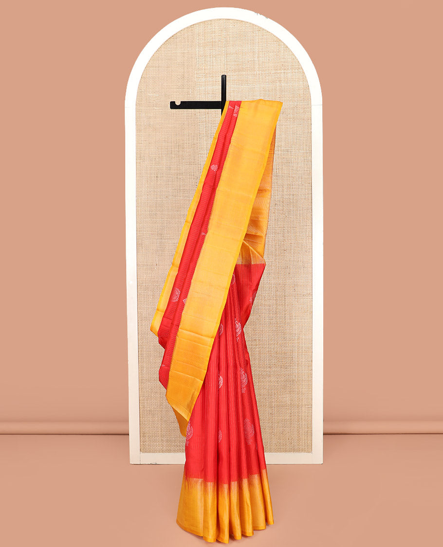 Red Kanchipuram Silk Saree Enriched with Zari Buttas on Its Body, Complemented by a Contrast Border, Captivating Pallu of Sparsely Woven Designs, and Paired with a Contrast Blouse