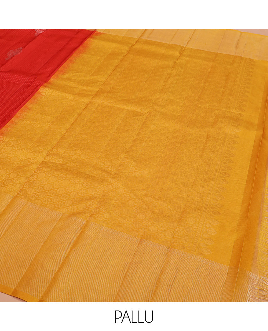 Red Kanchipuram Silk Saree Enriched with Zari Buttas on Its Body, Complemented by a Contrast Border, Captivating Pallu of Sparsely Woven Designs, and Paired with a Contrast Blouse