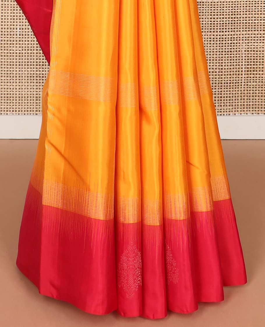 Orange checked mayuri soft silk saree with contrast floral design border & geometric design border