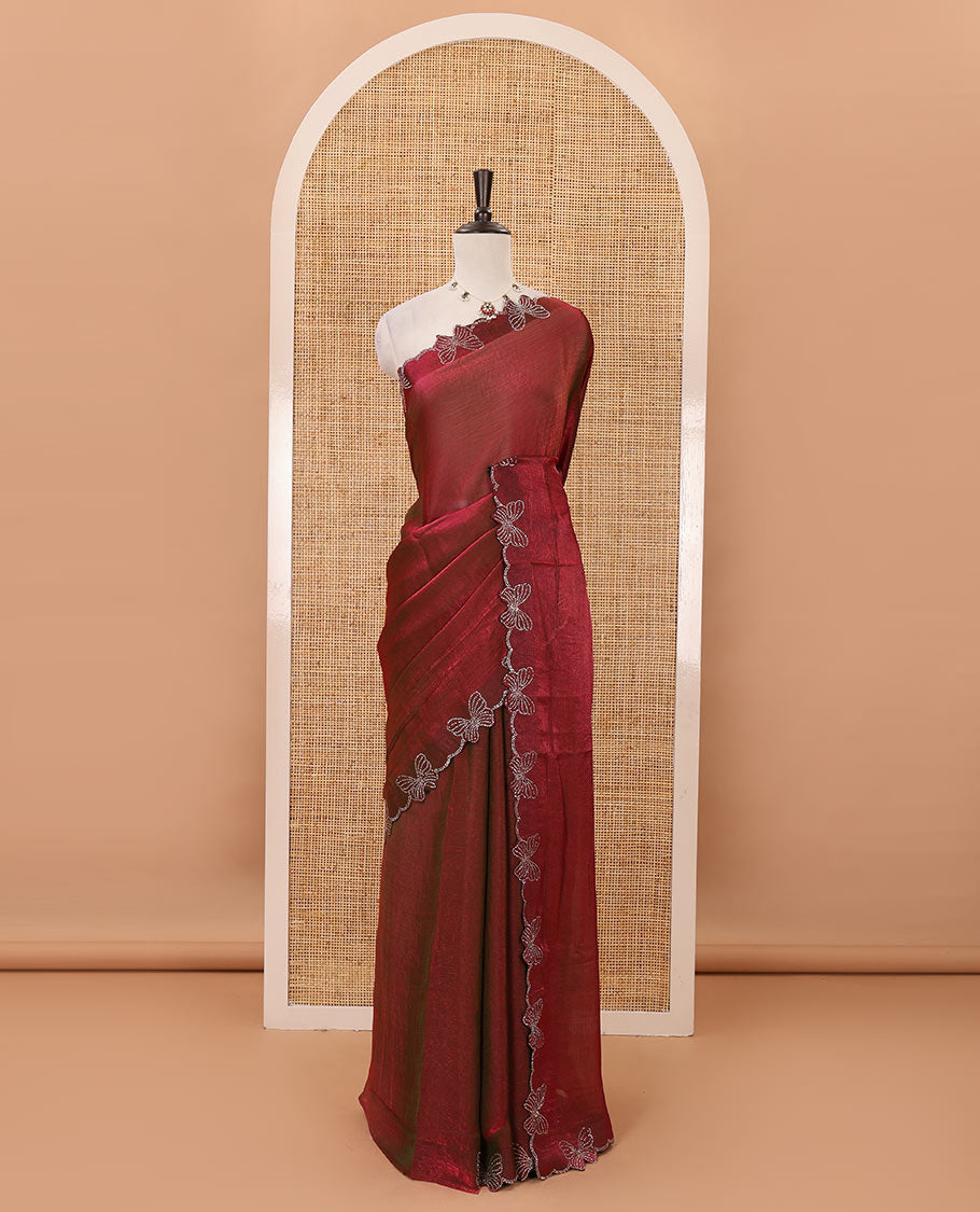 Maroon full-plain Fendi chiffon saree, scallop butterfly-style Swarovski stone work border & stone work matching blouse
