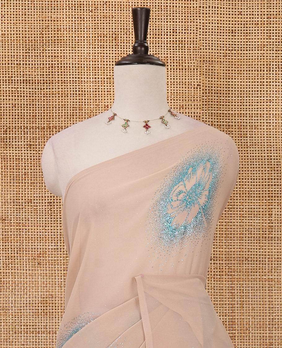 Borderless cream 60 gm georgette saree features floral vine designs, glitter embroidery work, contrast plain blouse