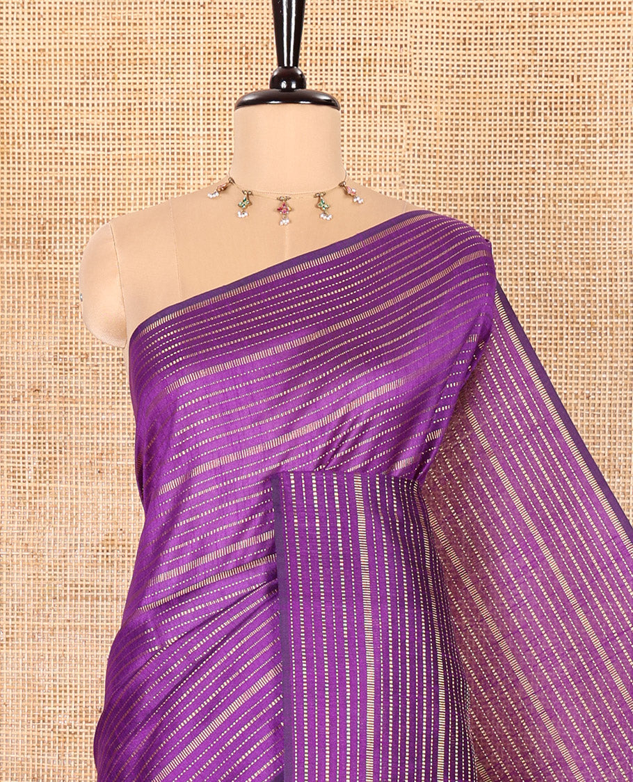 Borderless Dark Violet Semi-Raw Silk Saree Embellished with Gold-Zari Horizontal Stripes All Over Its Body, Complemented by a Contrast Pallu of Stripes, and Paired with a Contrast Blouse