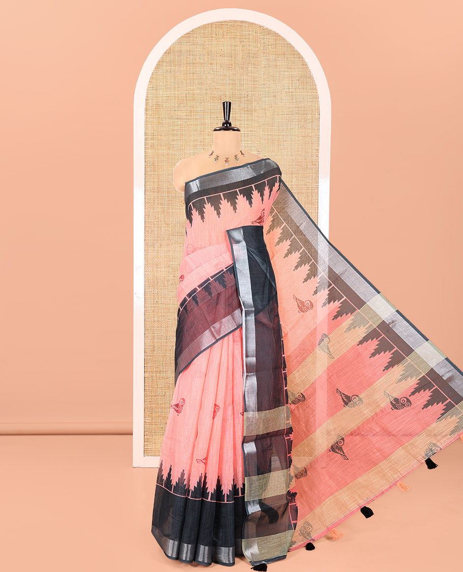 Peach Linen Cotton Saree, Adorned with Owl Buttas Printed on Its Body, Complemented by Contrast Temple Zari Border, Pallu of the Same Print, and Paired with a Contrast Blouse