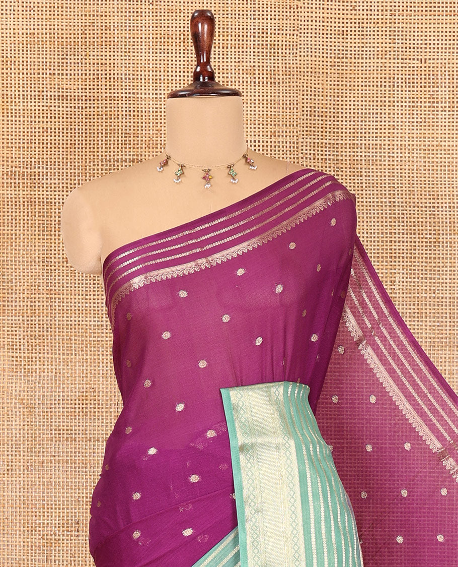 Violet Art Crepe Saree Features Zari Buttas, Complemented by Contrast Traditional Zari Border, Zari Striped Pallu, and a Contrast Blouse