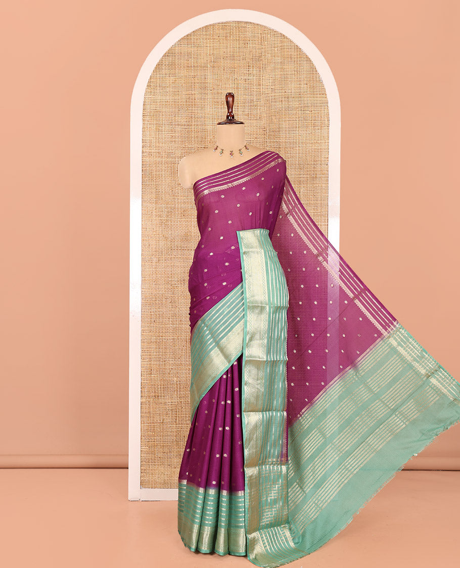Violet Art Crepe Saree Features Zari Buttas, Complemented by Contrast Traditional Zari Border, Zari Striped Pallu, and a Contrast Blouse
