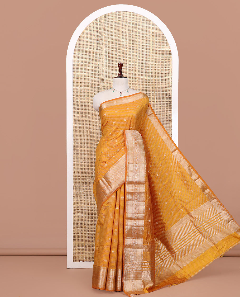 Mustard Semi-Tussar Saree, Enriched with Zari Buttas and Checks, a Traditional Zari Border, and a Matching Blouse