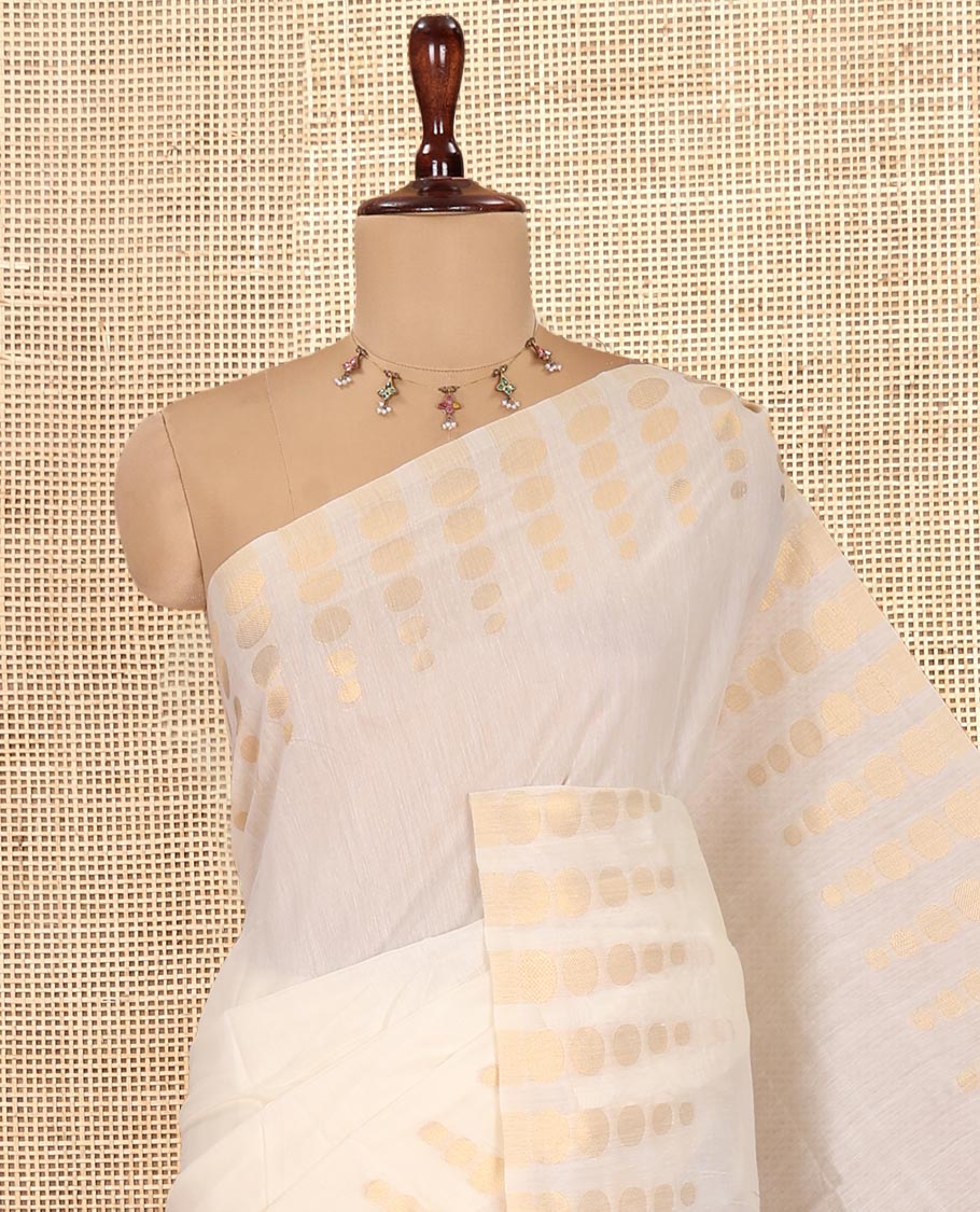 Cream Plain Chanderi Cotton Saree, Highlighted by Coin Zari Motifs Border, and a Matching Blouse