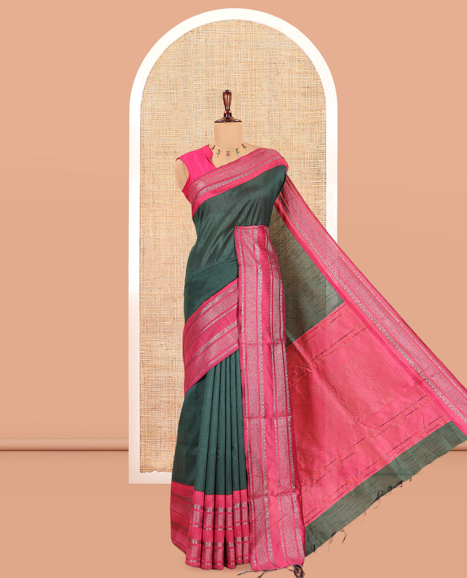 Bottle Green Plain Semi-Raw Silk Saree, a Contrast Silver Zari Border, a Contrast Pallu, and a Contrast Blouse