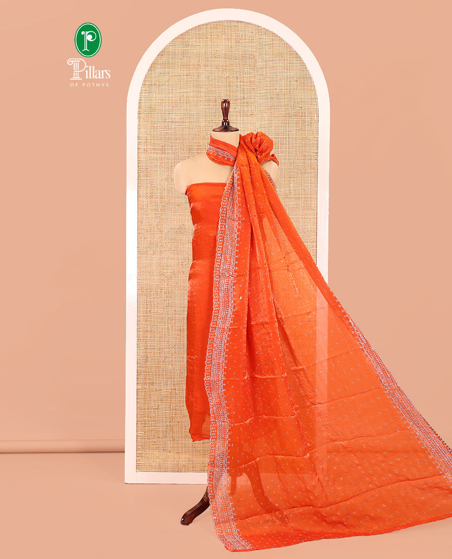 Rust Fendi Organza Material Chudidar Fetaures Pom-Pom-Neckline Top, Plain Bottom, and Scallop Embroidered Dupatta
