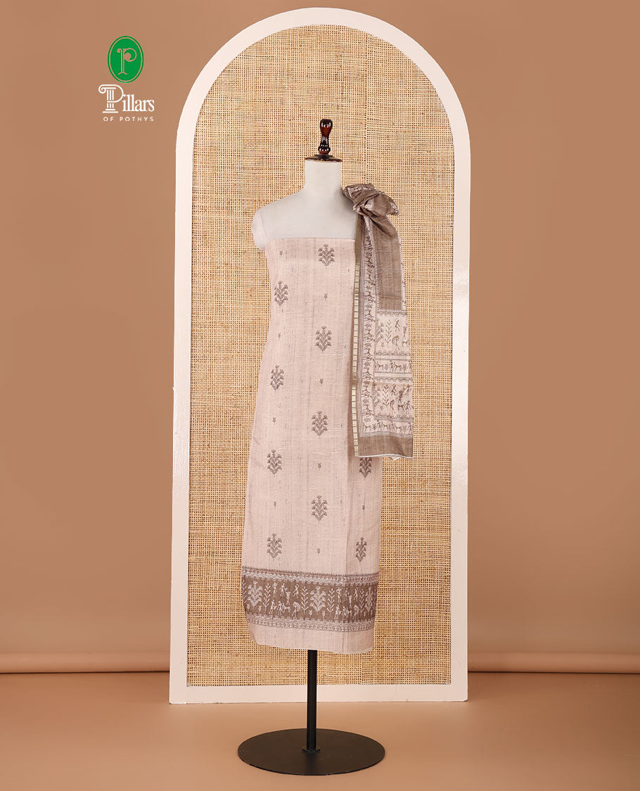 Chikku-base semi-tussar material chudidar set, floral & warli motifs top, contrast brown plain bottom & warli motifs steeped dupatta