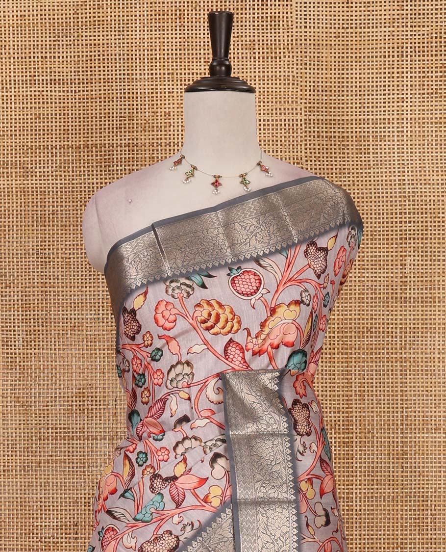 Grey kalamkari floral vine printed fancy tussar saree, contrast traditional zari border, intricate pallu, and floral printed zari border blouse