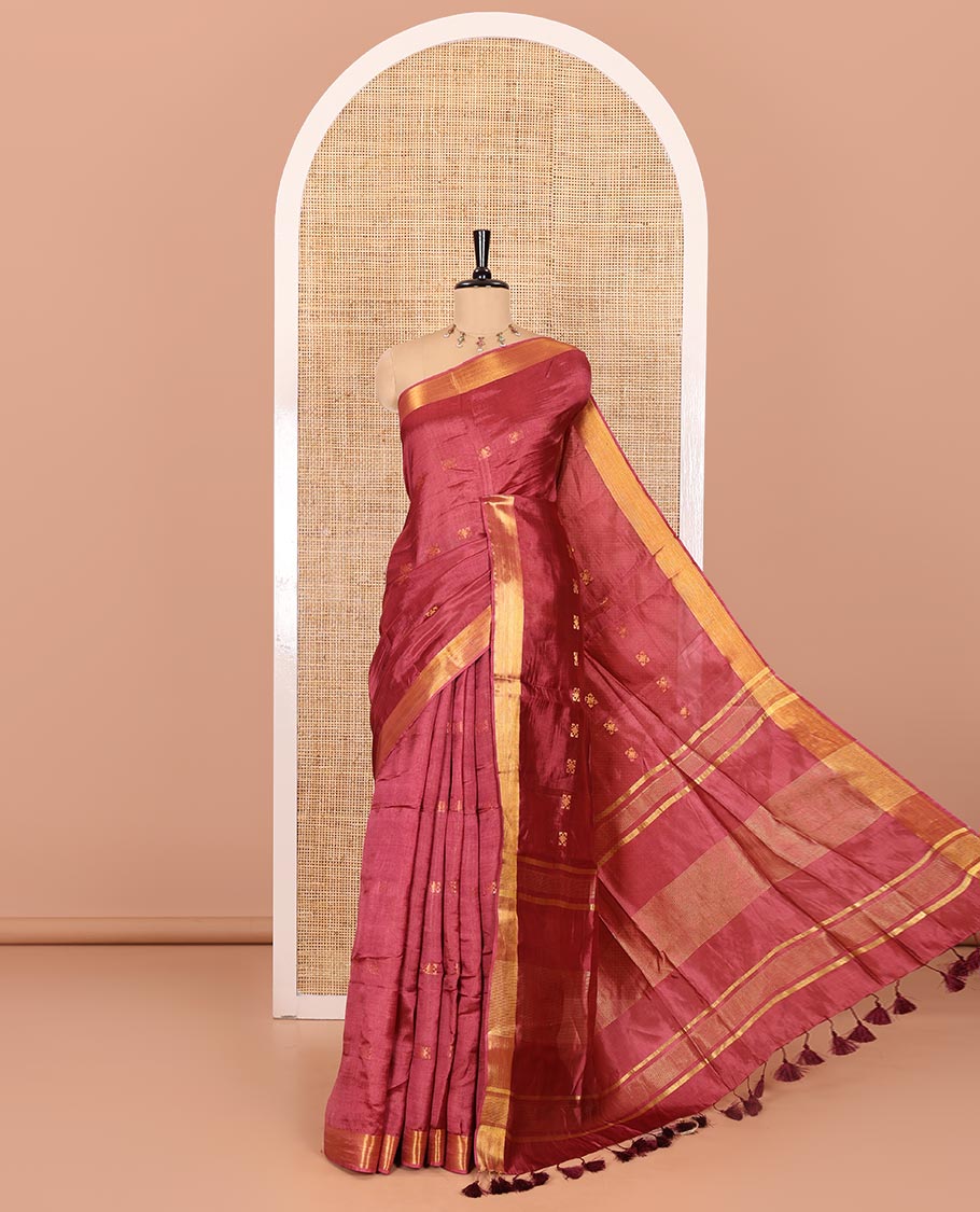 Onion pink zari buttas banana pith silk saree, zari bavanji border, zari striped pallu, and a matching zari design blouse