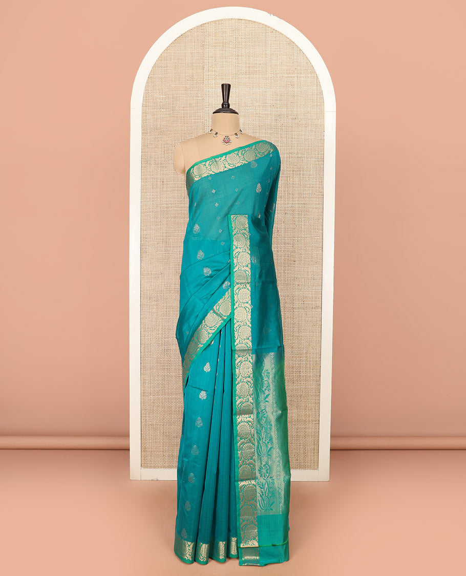 Blue Silk Cotton Saree Prettified with Floral Buttas All Over the Body, Complemented by a Contrast Floral Creeper Border, Featuring a Contrast Pallu of Floral Zari Designs, and Paired with a Contrast Blouse
